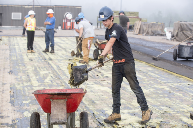 A high school student taking part in the Building Futures for Youth program to introduce trades to young people.